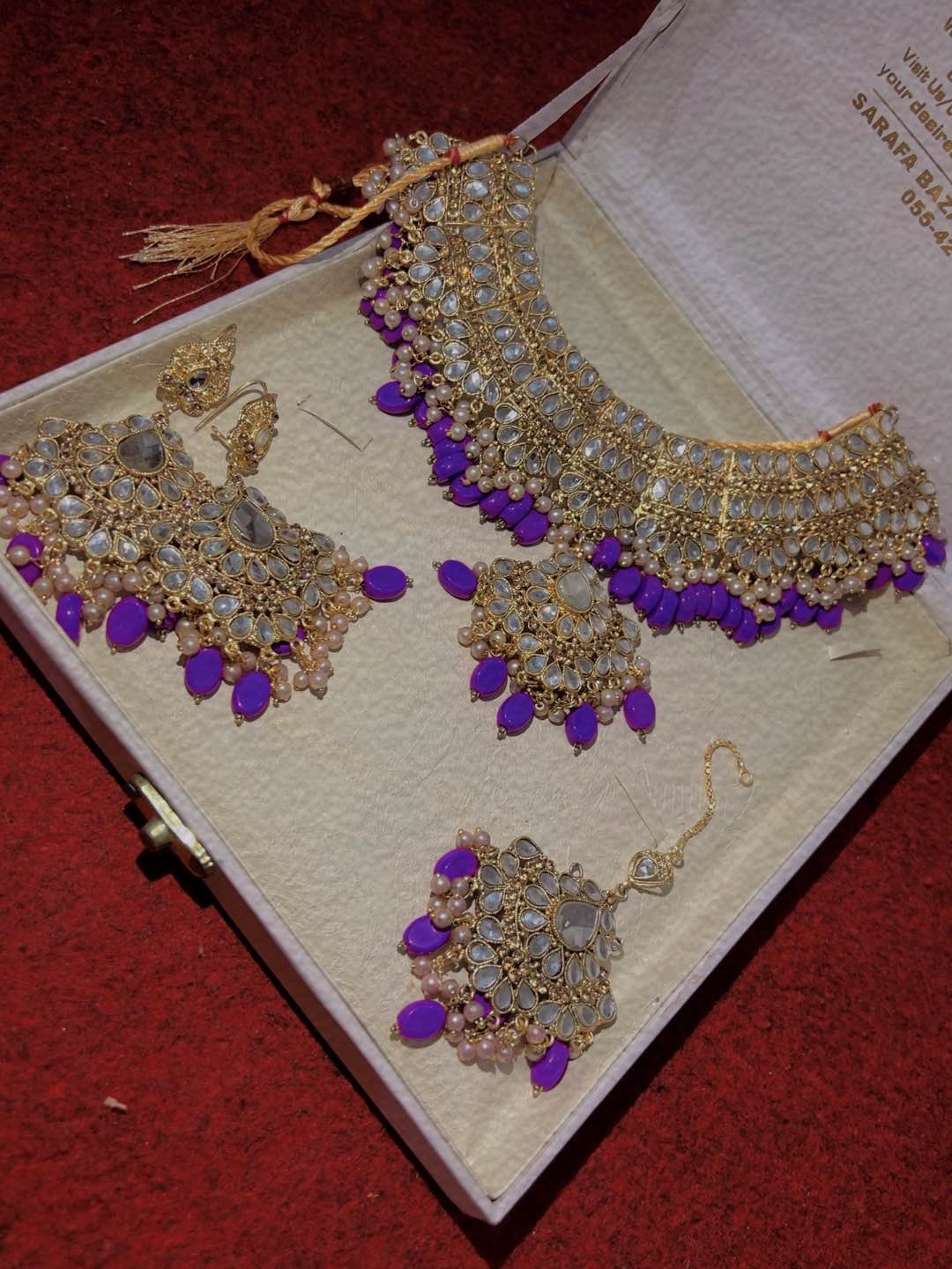 Gundan style one carat golden color with purple stone