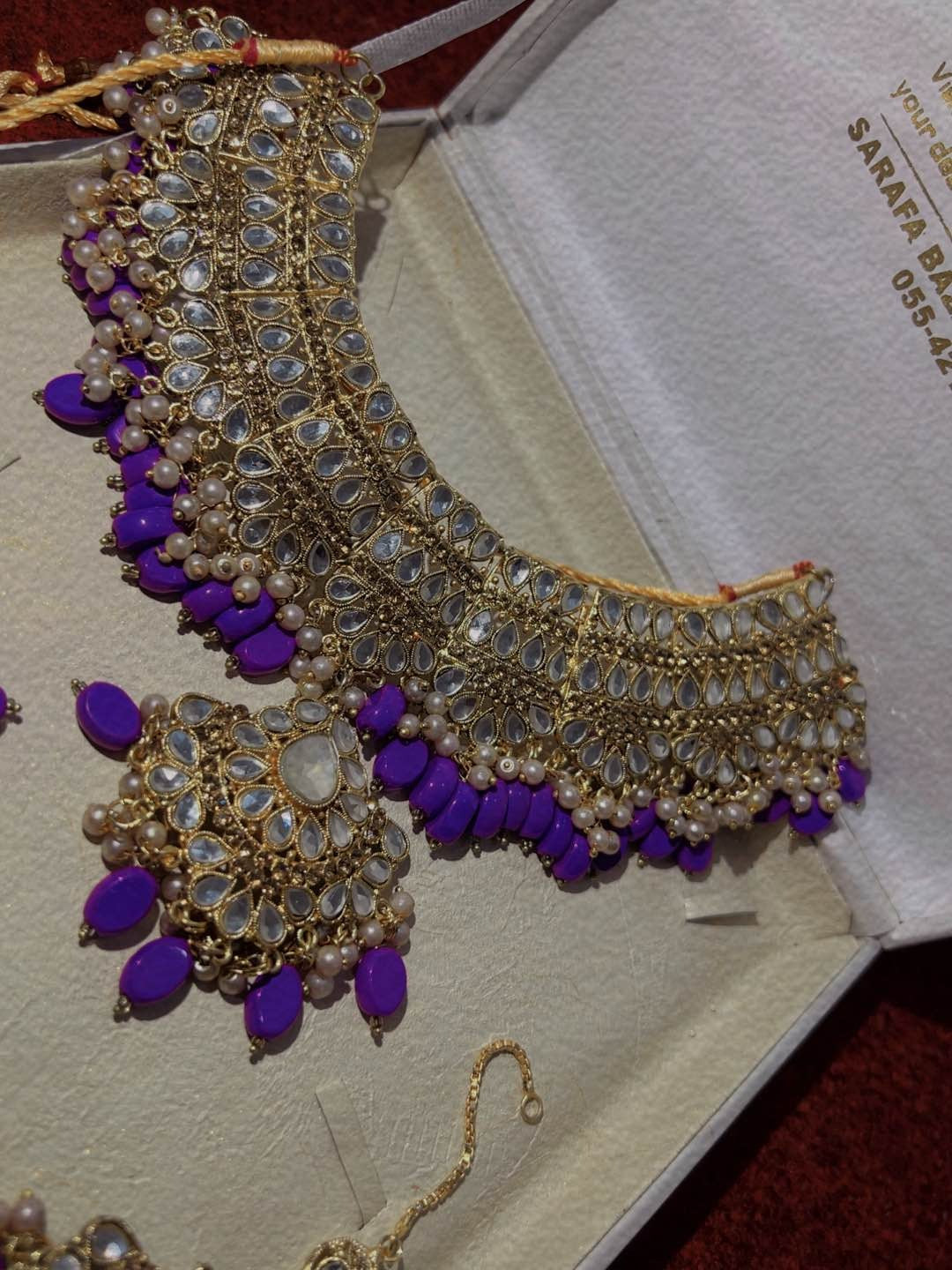 Gundan style one carat golden color with purple stone