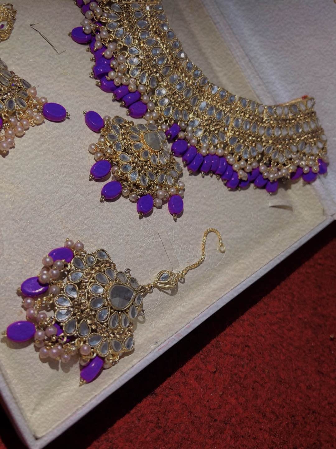 Gundan style one carat golden color with purple stone